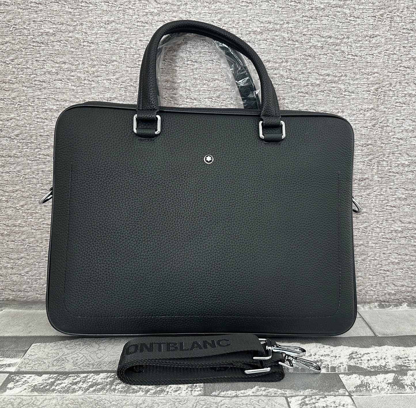 Portafolio negro de Piel Genuina, perfecto para laptops