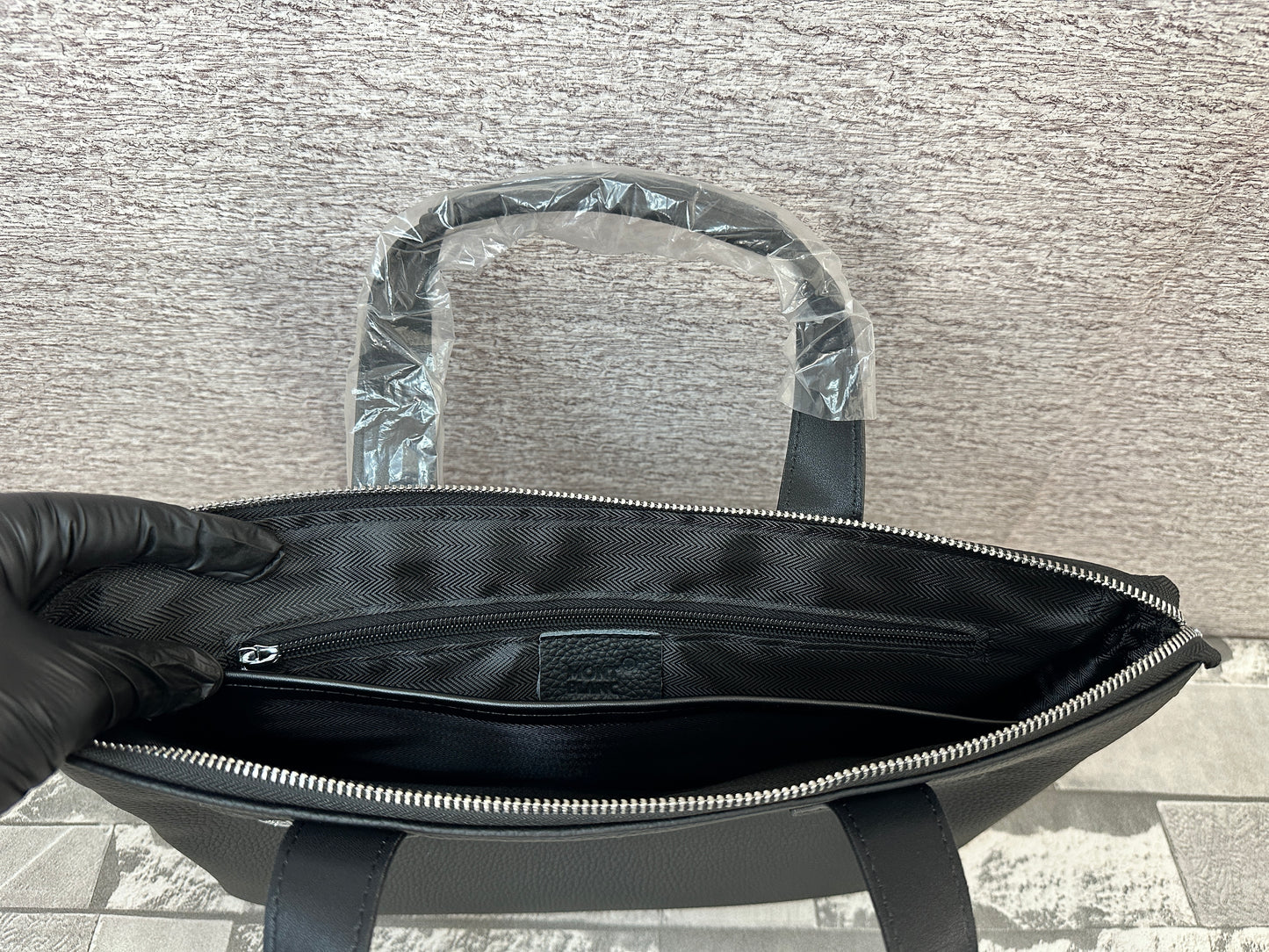 Portafolio negro de Piel Genuina, perfecto para laptops