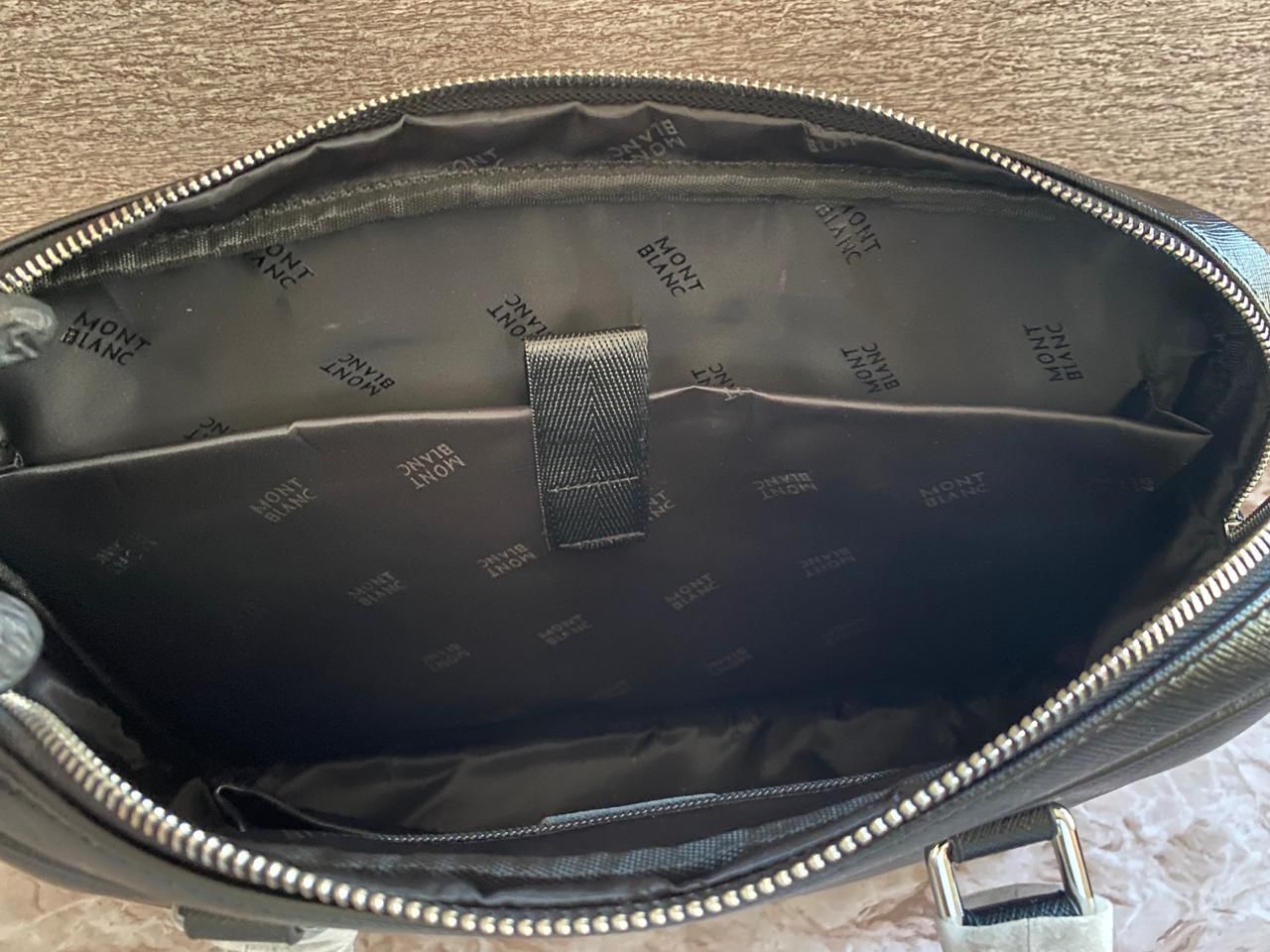 Portafolio negro de Piel Genuina, perfecto para laptops