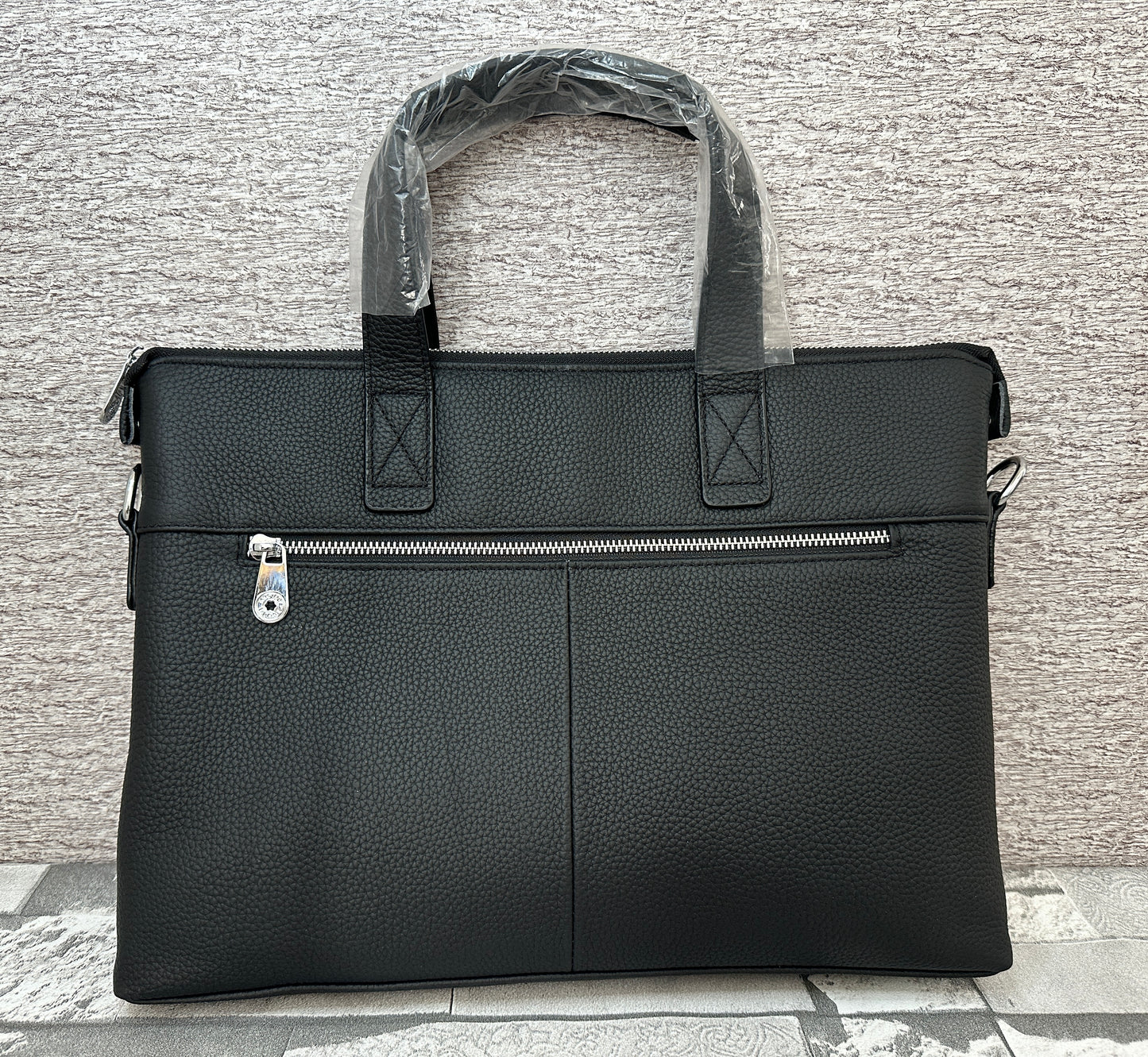 Portafolio negro de Piel Genuina, perfecto para laptops