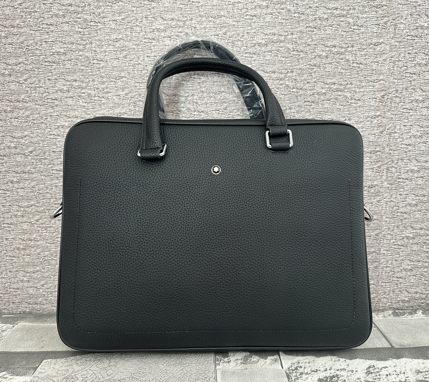 Portafolio negro de Piel Genuina, perfecto para laptops