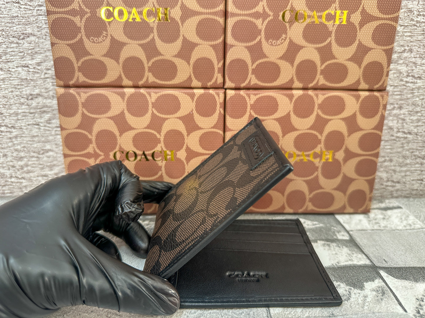 Cartera cafe C0ach con monograma