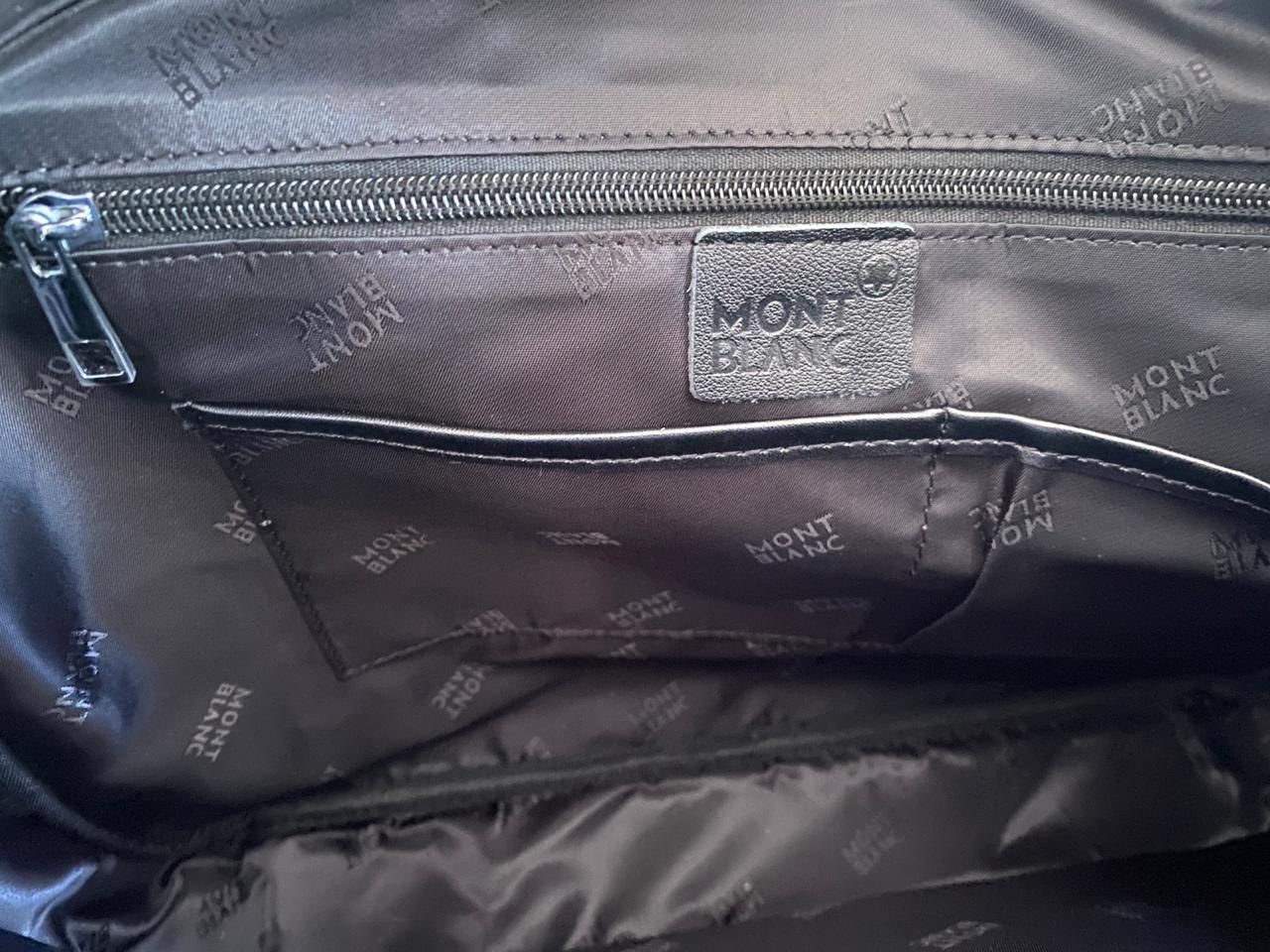 Portafolio negro de Piel Genuina, perfecto para laptops