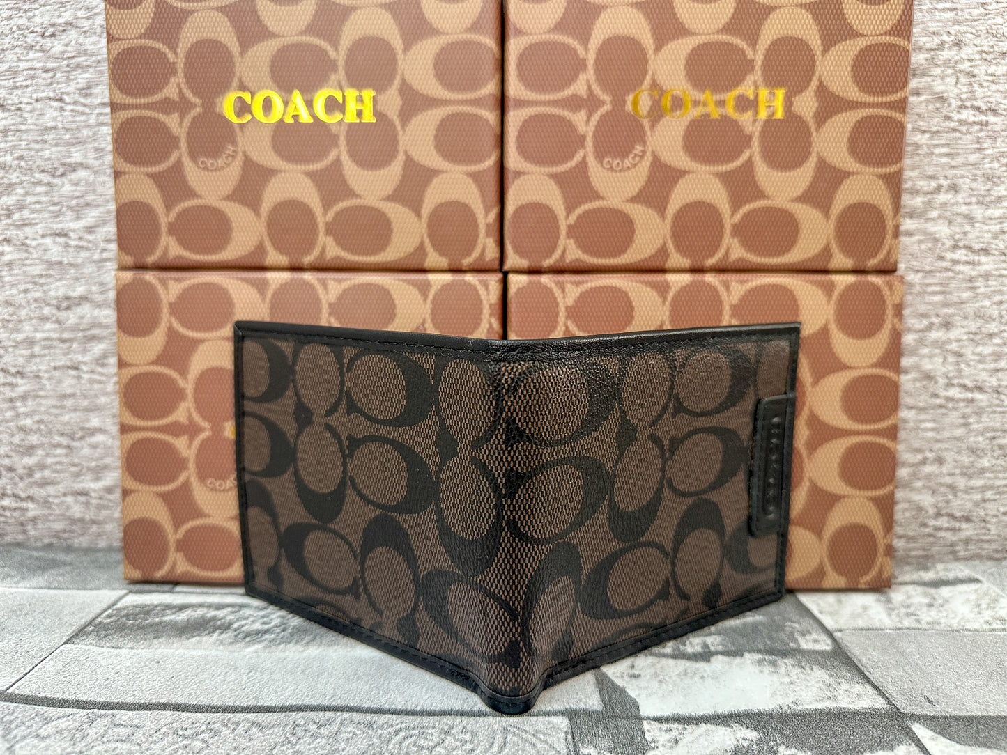 Cartera cafe C0ach con monograma